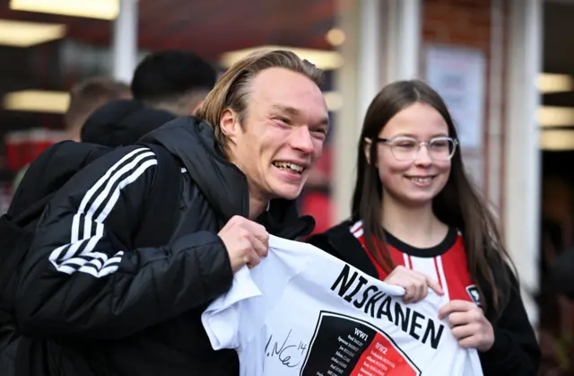 Ilmari Niskanen with a fan
