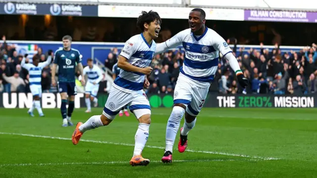Koki Saito celebrates opening the scoring against Leicester