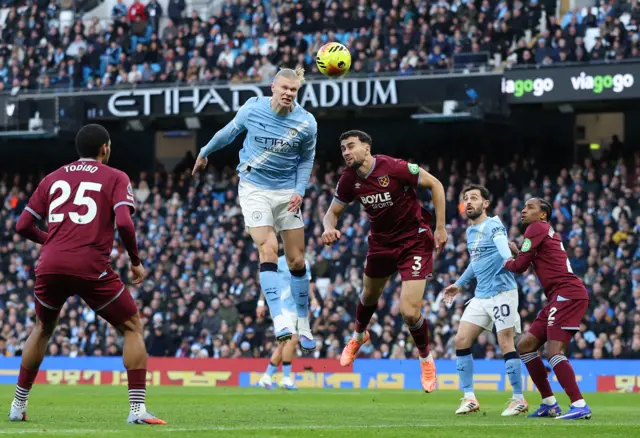 Manchester City's Erling Haaland misses a chance to score with a header