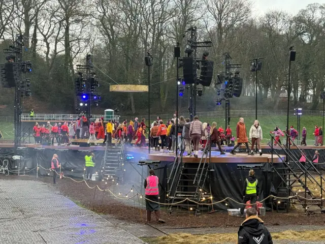 Performers rehearsing before the start of the ceremony