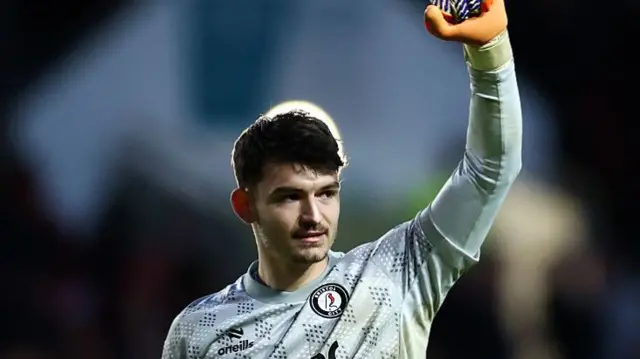 Bristol City goalkeeper Max O'Leary raises a fist in celebration