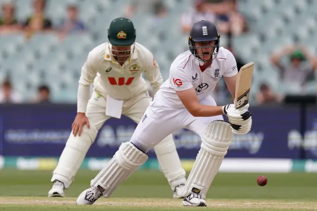 England’s Jamie Smith (right) bats on day five of the third NRMA Insurance Ashes Series 2025 test at the Adelaide Oval, Australia