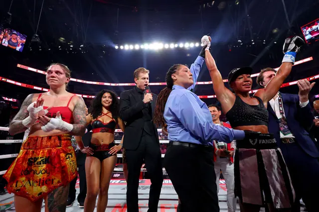 Alycia Baumgardner is announced the winner as Leila Beaudoin claps