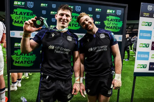 Kyle Steyn (right) poses with player of the match Rory Darge