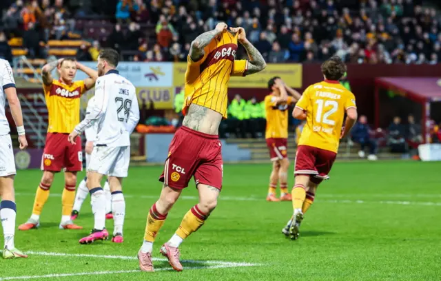 Motherwell's Callum Slattery with his shirt over his head