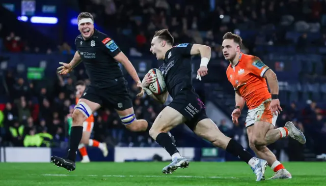 Jamie Dobie runs in to score for Glasgow
