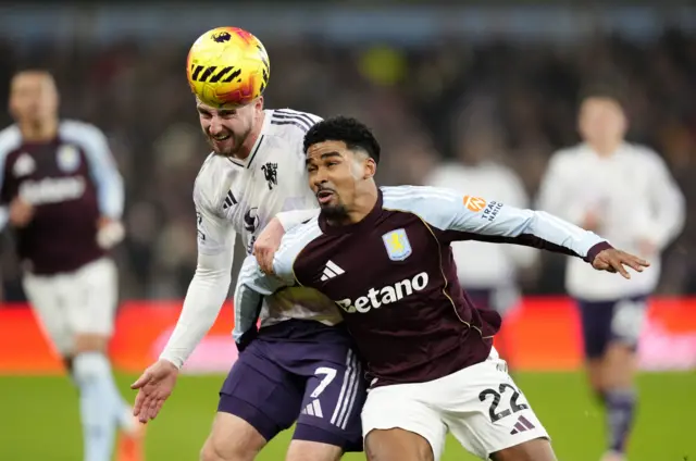 Manchester United's Mason Mount (left) and Aston Villa's Ian Maatsen battle for the ball during the Premier League match at Villa Park,