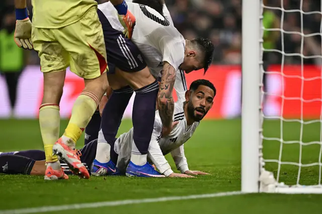 Manchester United's Brazilian striker #10 Matheus Cunha reacts after missing a chance during the English Premier League football match between Aston Villa and Manchester United at Villa Park in Birmingham, central England on December 21, 2025.