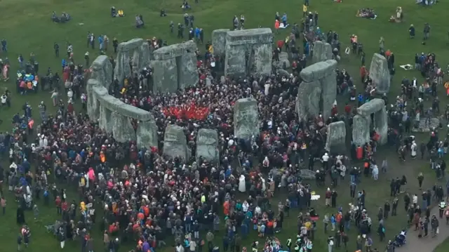 People gathring at Stonehenge