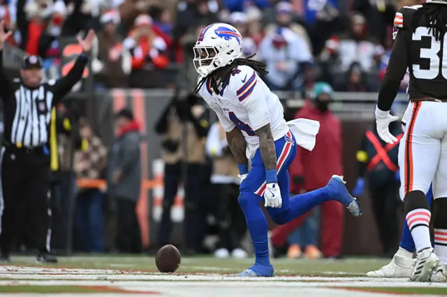 Buffalo Bills running back James Cook celebrates scoring a touchdown.