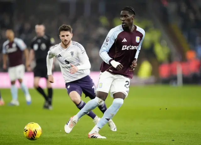 Aston Villa's Amadou Onana (right) and Manchester United's Mason Mount battle for the ball during the Premier League match at Villa Park, Birmingham.