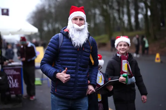 A fan wearing a Christmas hat before the Premier League match at Villa Park, Birmingham. Picture date: Sunday December 21, 2025.