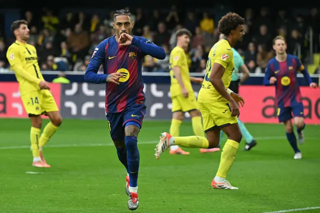 Barcelona's Brazilian forward #11 Raphinha celebrates scoring the opening goal during the Spanish league football match between Villarreal CF and FC Barcelona at La Ceramica Stadium in Vila-real.