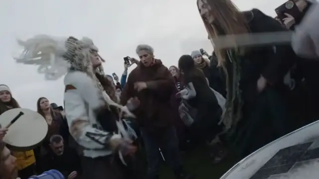 People gathring at Stonehenge