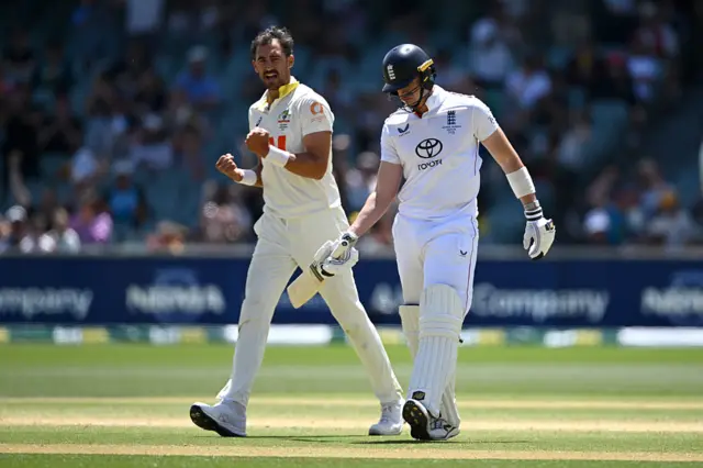 Mitchell Starc celebrates the wicket of Jamie Smith