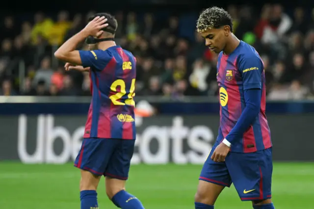 Barcelona's Spanish forward #10 Lamine Yamal (R) reacts to missing a goal opportunity during the Spanish league football match between Villarreal CF and FC Barcelona at La Ceramica Stadium in Vila-real on December 21, 2025.