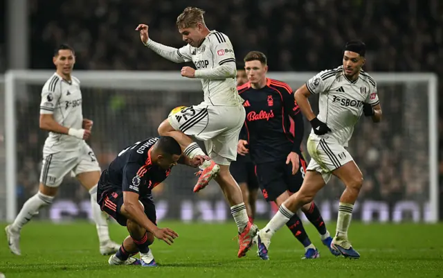 Nottingham Forest's Brazilian defender #05 Murillo (2L) clashes with Fulham's English midfielder #32 Emile Smith Rowe