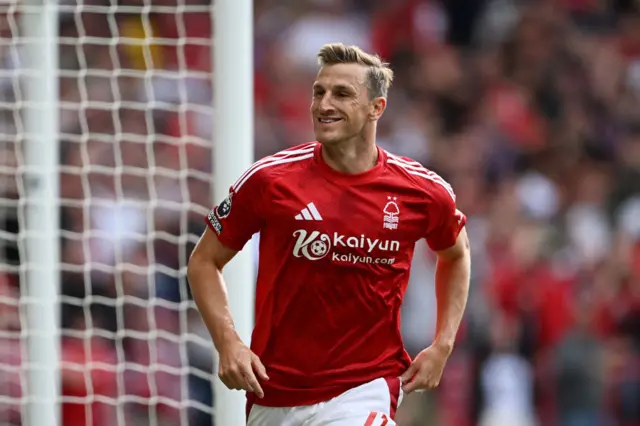Chris Wood of Nottingham Forest celebrates scoring his team's first goal during the Premier League match between Nottingham Forest FC and AFC Bournemouth at City Ground on August 17, 2024 in Nottingham, England.