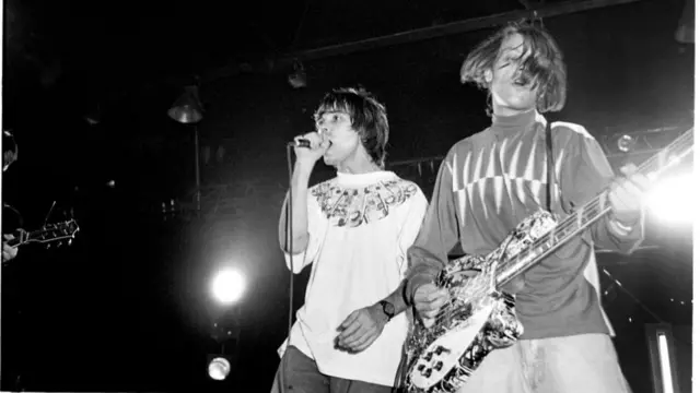 Mani (right) and Ian Brown playing in Brielpoort, Deinze, Belgium, on 1 October 1989