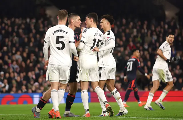 Nikola Milenkovic of Nottingham Forest clashes with Joachim Andersen, Jorge Cuenca and Antonee Robinson of Fulham