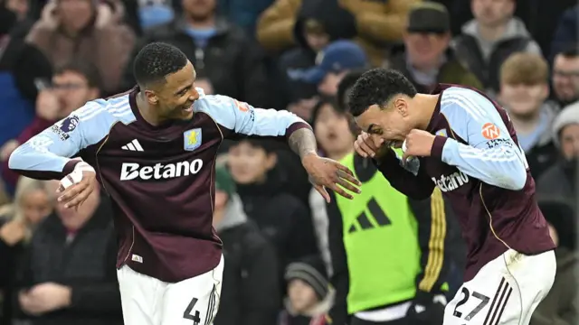 Aston Villa players celebrate