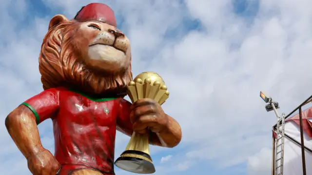 A photo of the AFCON 2025 football mascot