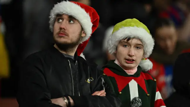 Palace fans wearing Santa hats