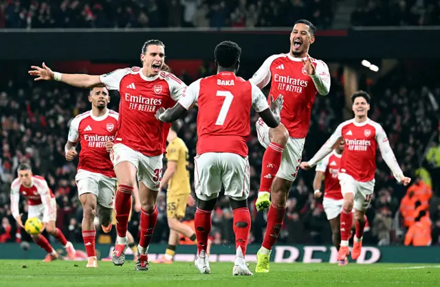 Arsenal's players celebrate taking the lead against Crystal Palace