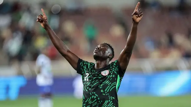 Footballer Akor Adams playing football for Nigeria