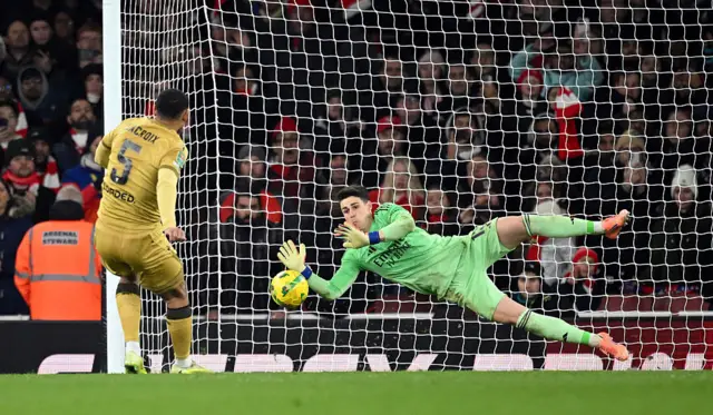Kepa Arrizabalaga of Arsenal saves the eighth penalty from Maxence Lacroix of Crystal Palace to win the penalty shoot out during the Carabao Cup Quarter Final match between Arsenal and Crystal Palace