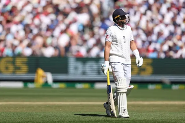 England's Joe Root leaves the field
