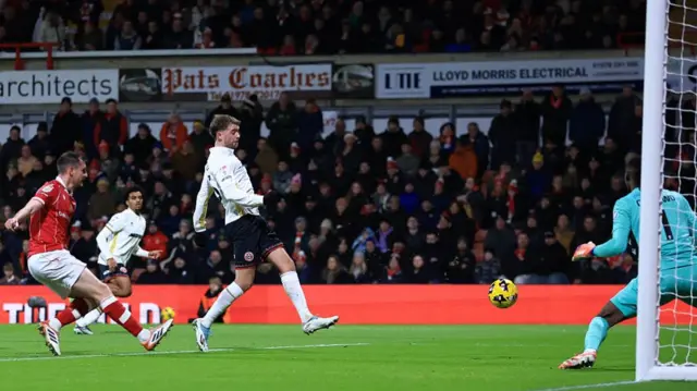 Patrick Bamford finishes at the far post