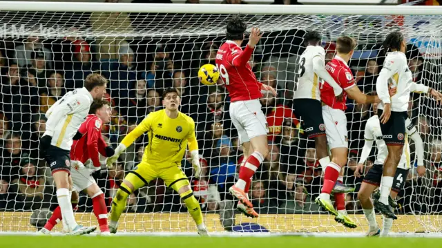 Kieffer Moore heads Wrexham's second goal against Sheffield United