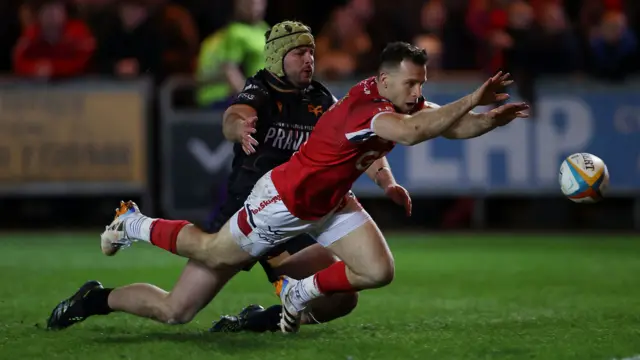 Gareth Davies leaps for the ball
