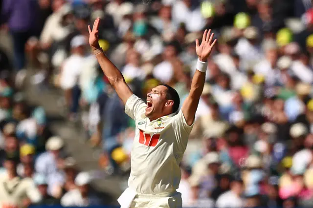 Scott Boland of Australia celebrates