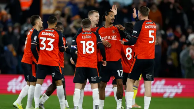 Luton celebrate against Wycombe