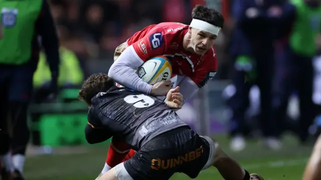 Tom Rogers tackled