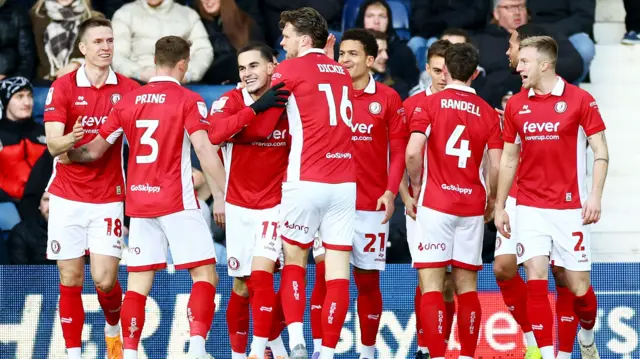 Bristol City players celebrate with Anis Mehmeti