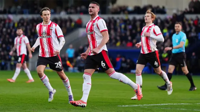 Taylor Harwood-Bellis celebrates his goal against Oxford