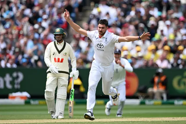Josh Tongue of England celebrates with teammates after dismissing Steve Smith