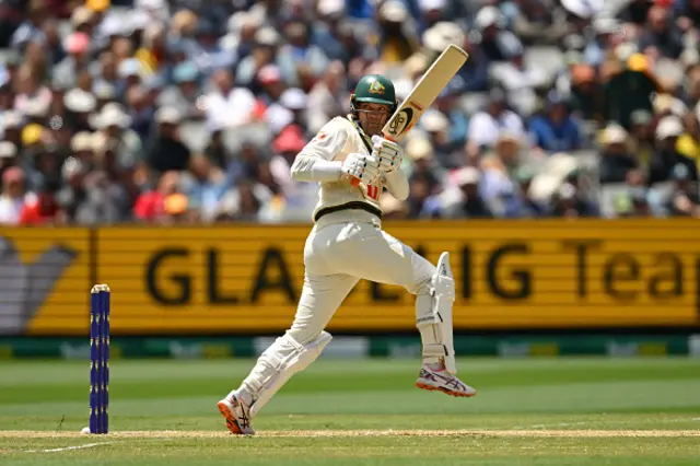 Alex Carey of Australia plays a shot