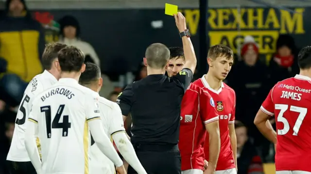 Wrexham's Ryan Longman is booked