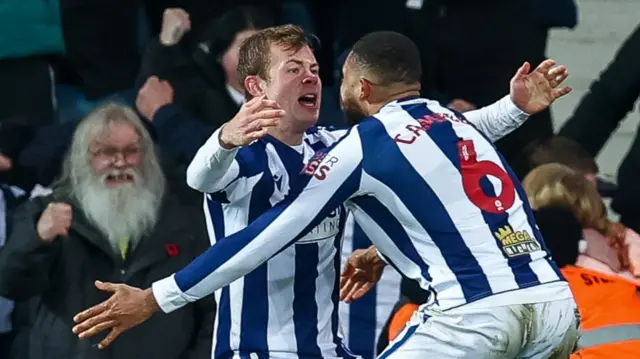 West Brom's Aune Heggebo (L)