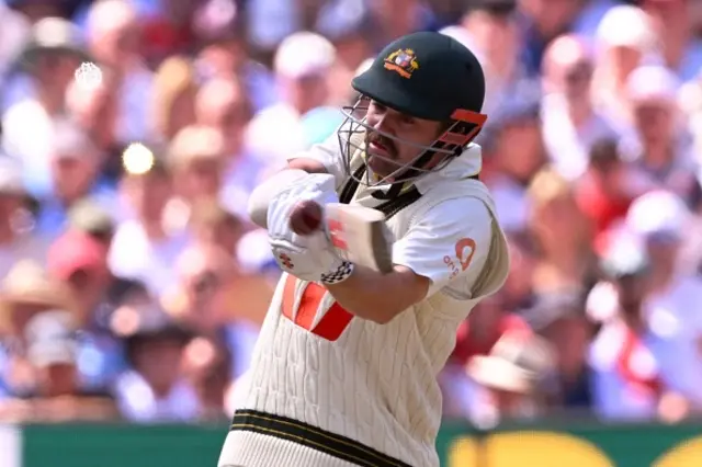 Australian batsman Travis Head plays a shot on the second day