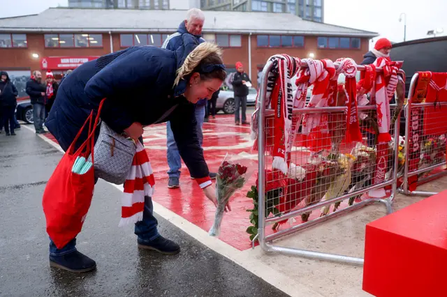 Tributes for Robertson outside the City Ground