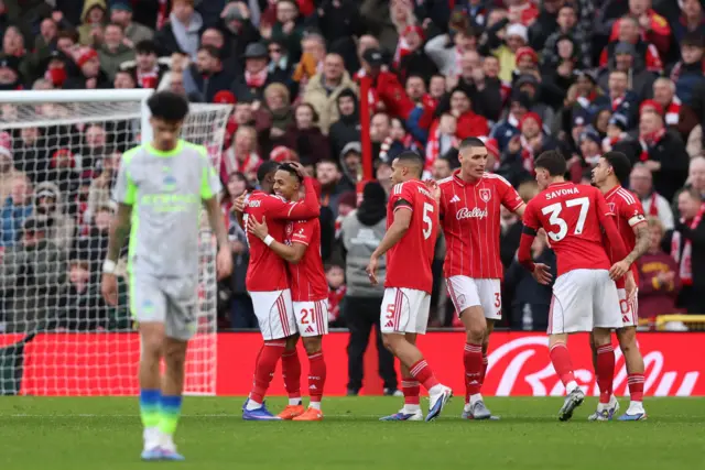 Nottingham Forest's Omari Hutchinson celebrates scoring their first goal with Callum Hudson-Odoi