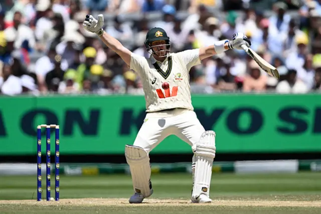 Steve Smith of Australia misjudges a ball from Brydon Carse