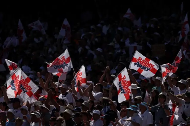 England's Barmy Army supporters cheer their team