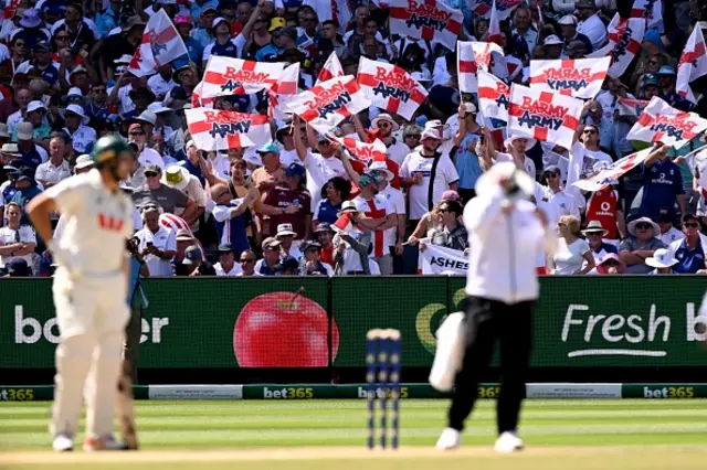 England fans cheer on their team on the second day