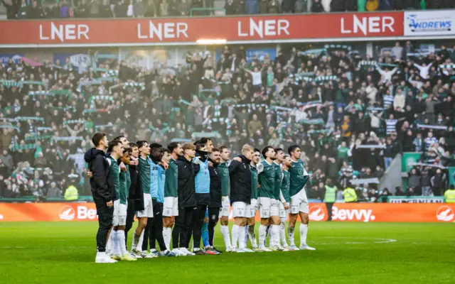 Hibs players are serenaded by their home support